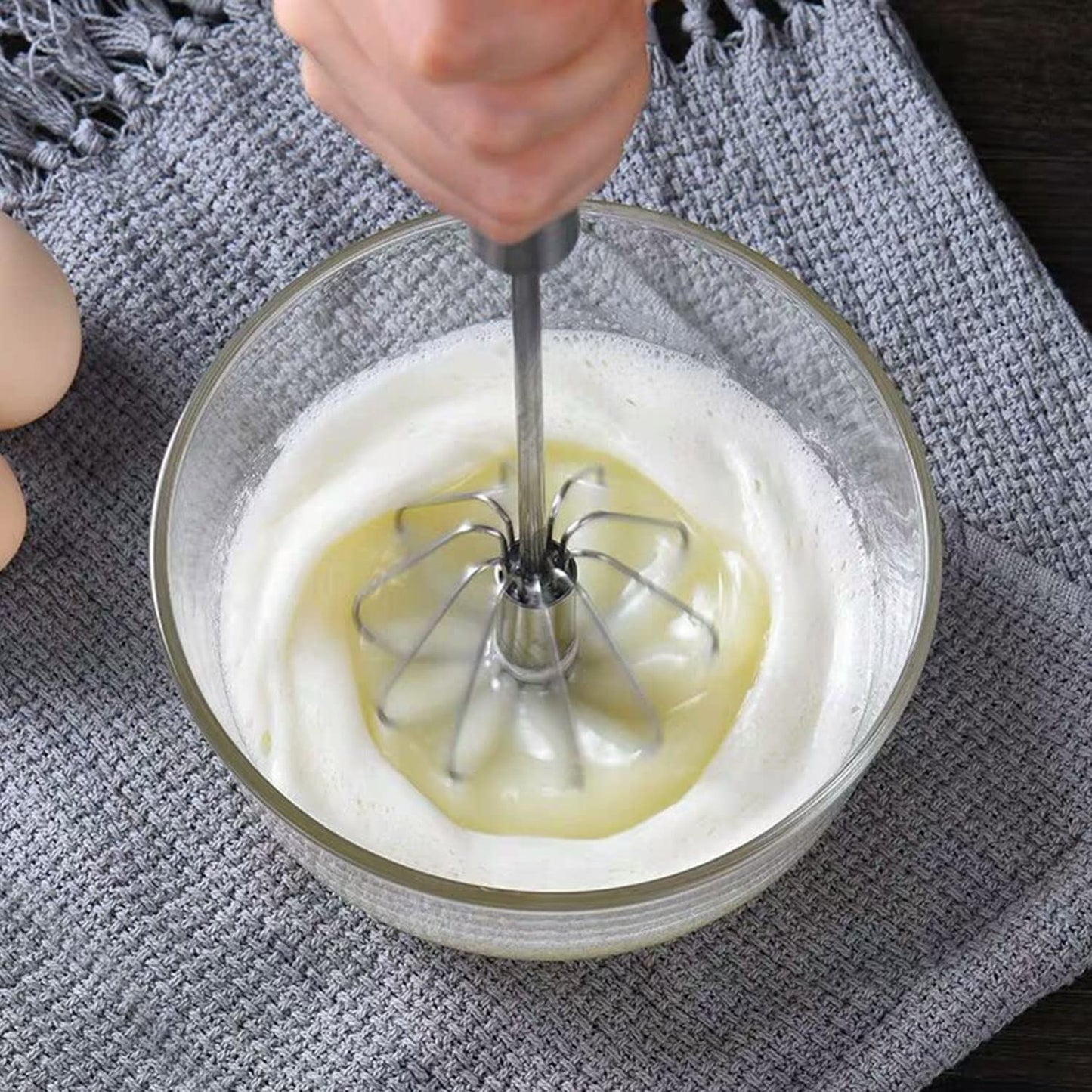 Household manual egg beater